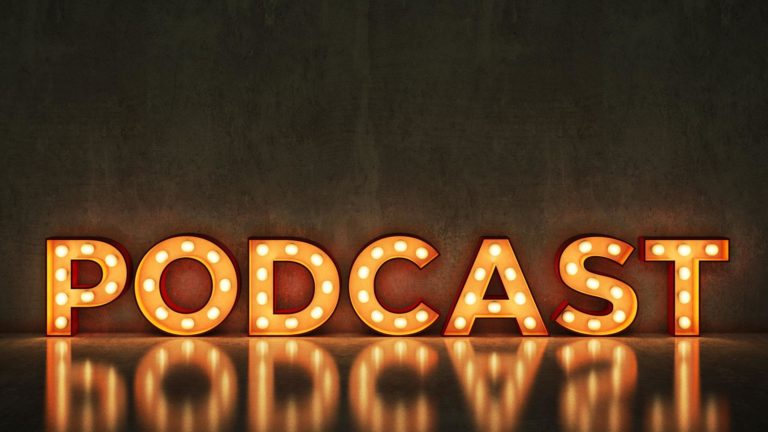 Podcast in lights on dark background.