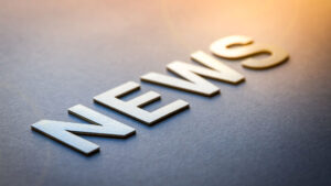 News written like it's on metal with sun in the background