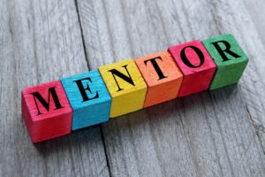 word mentor on colourful wooden cubes