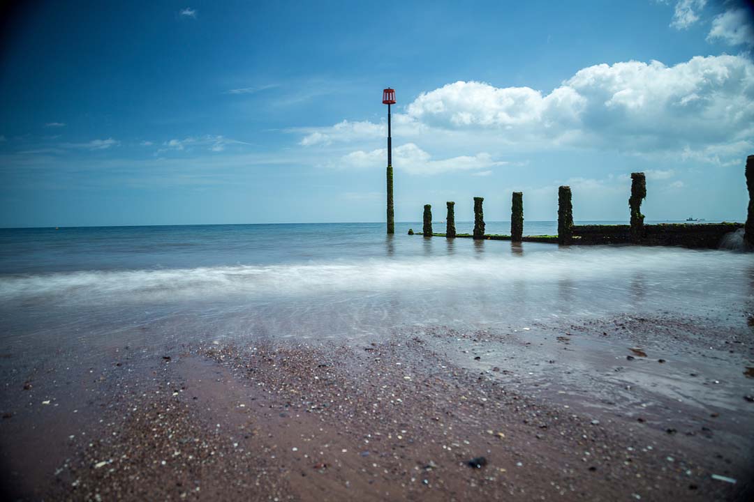 Shot of a UK beach on a sunny day looking out to the sea