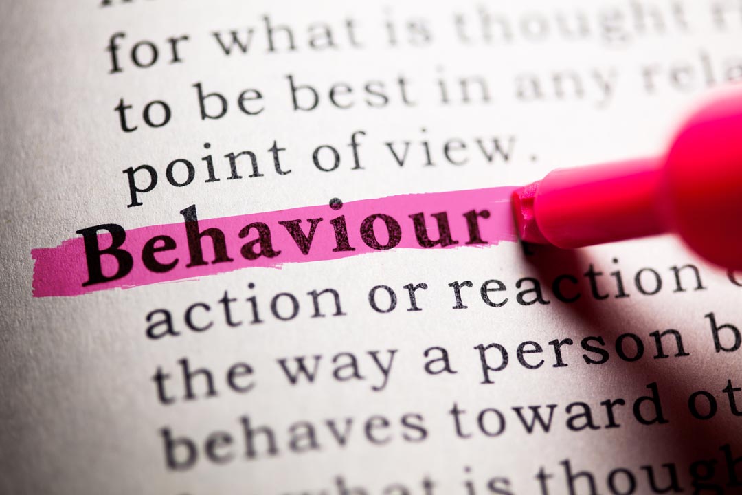 Dictionary page with the word "behaviour" highlighted