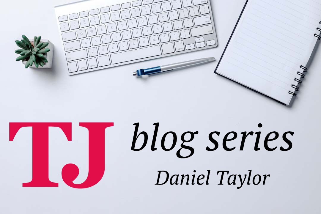 Keyboard, pot plant and note pad with the text TJ blog series Daniel Taylor