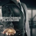 Workforce Planning with hologram businessman concept