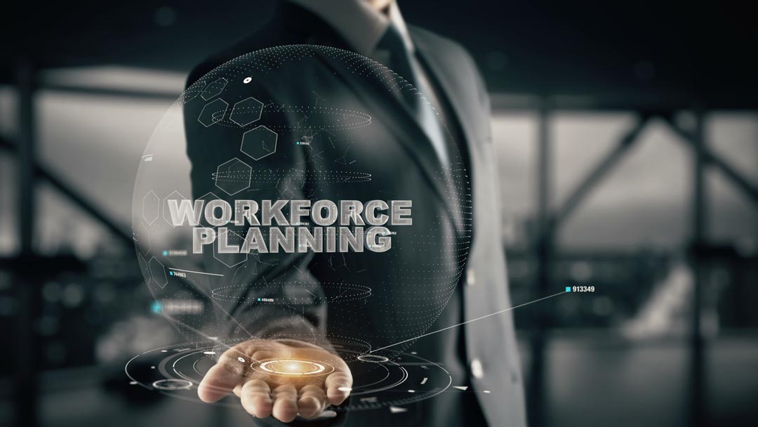 Workforce Planning with hologram businessman concept