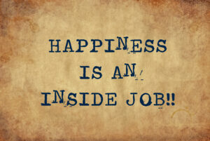 Inspiring motivation quote of happiness is an inside job with typewriter text. Distressed Old Paper with Typing image.