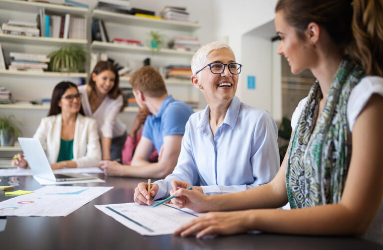 Successful group of business people at work in office