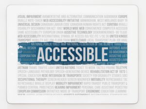"Accessible" written over teal band over page of writing.