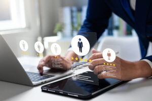 Human resource management technology (HR), Human resource manager touching human resource network structure and checks the CV online to choose the perfect employee for company, Effective recruitment.