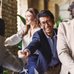 Multicultural Business Professionals Celebrating Success