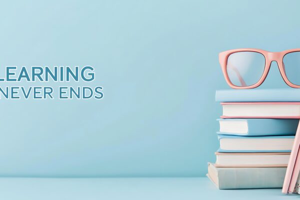 A motivational image with the phrase "Learning Never Ends" beside a stack of books and a pair of pink glasses, set against a light blue background.