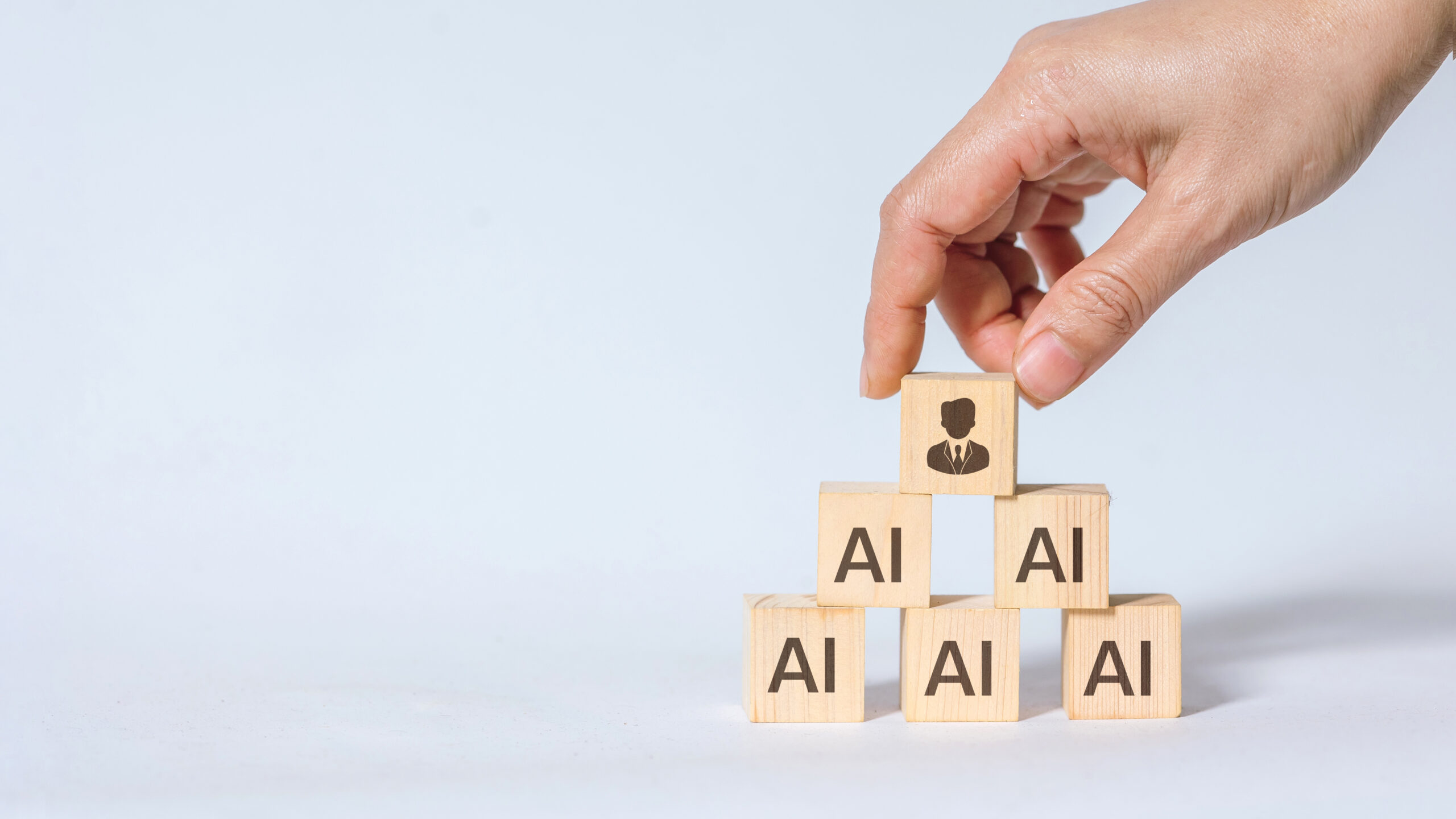 AI leadership pyramid and workforce hierarchy with human oversight in modern organization