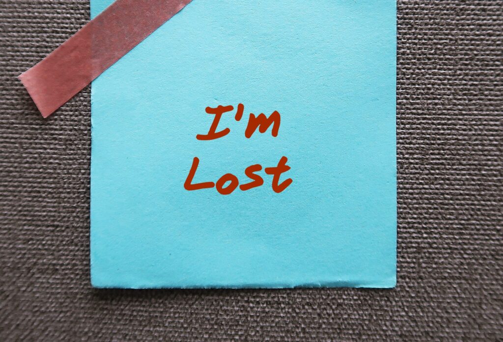 Blue paper note written - I'm Lost - emotionally or mentally confused and don't know what to do - feeling overwhelmed, confused, uncertain how to proceed in life