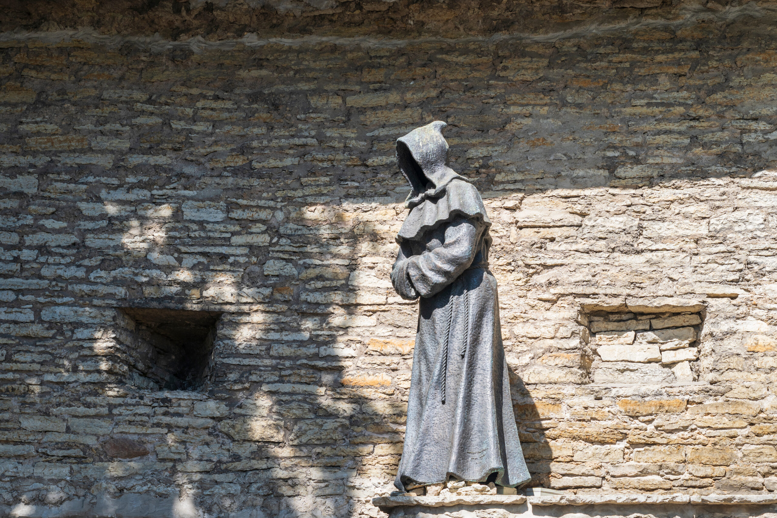 Hooded Traitor Statue in The old town of Tallinn in Estonia