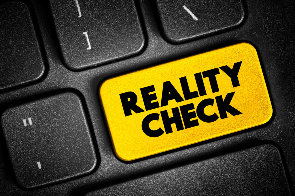 Reality Check text button on keyboard, concept background