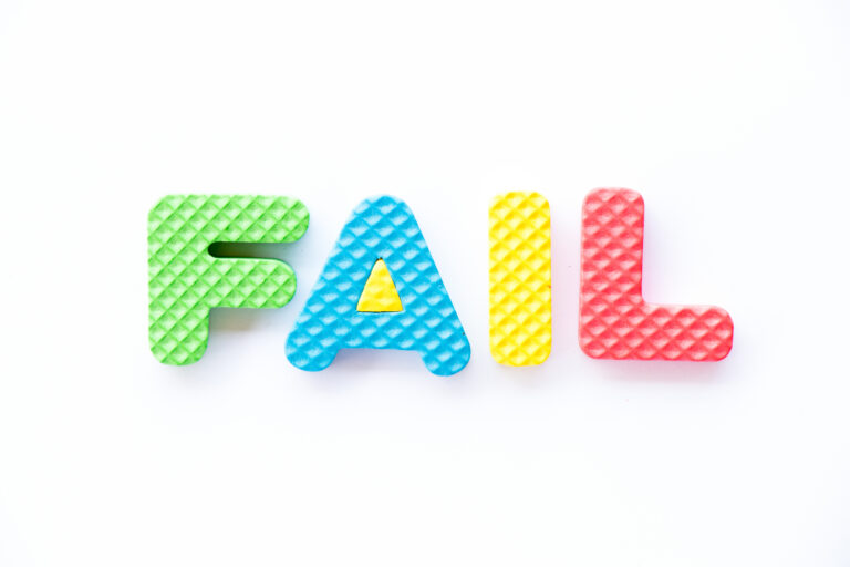 Color toy foam alphabet in word fail on white background