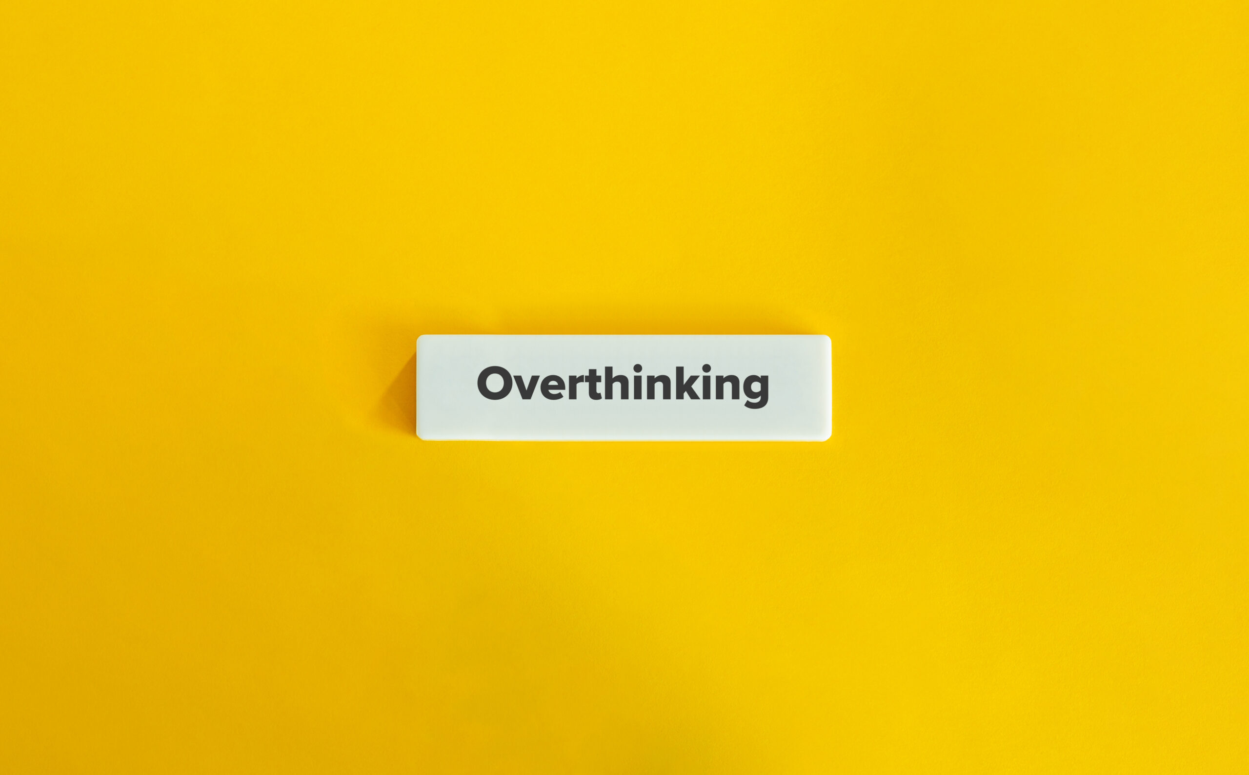 Overthinking Banner. Text on Block Letter Tile on Yellow Background. Minimal Aesthetic.