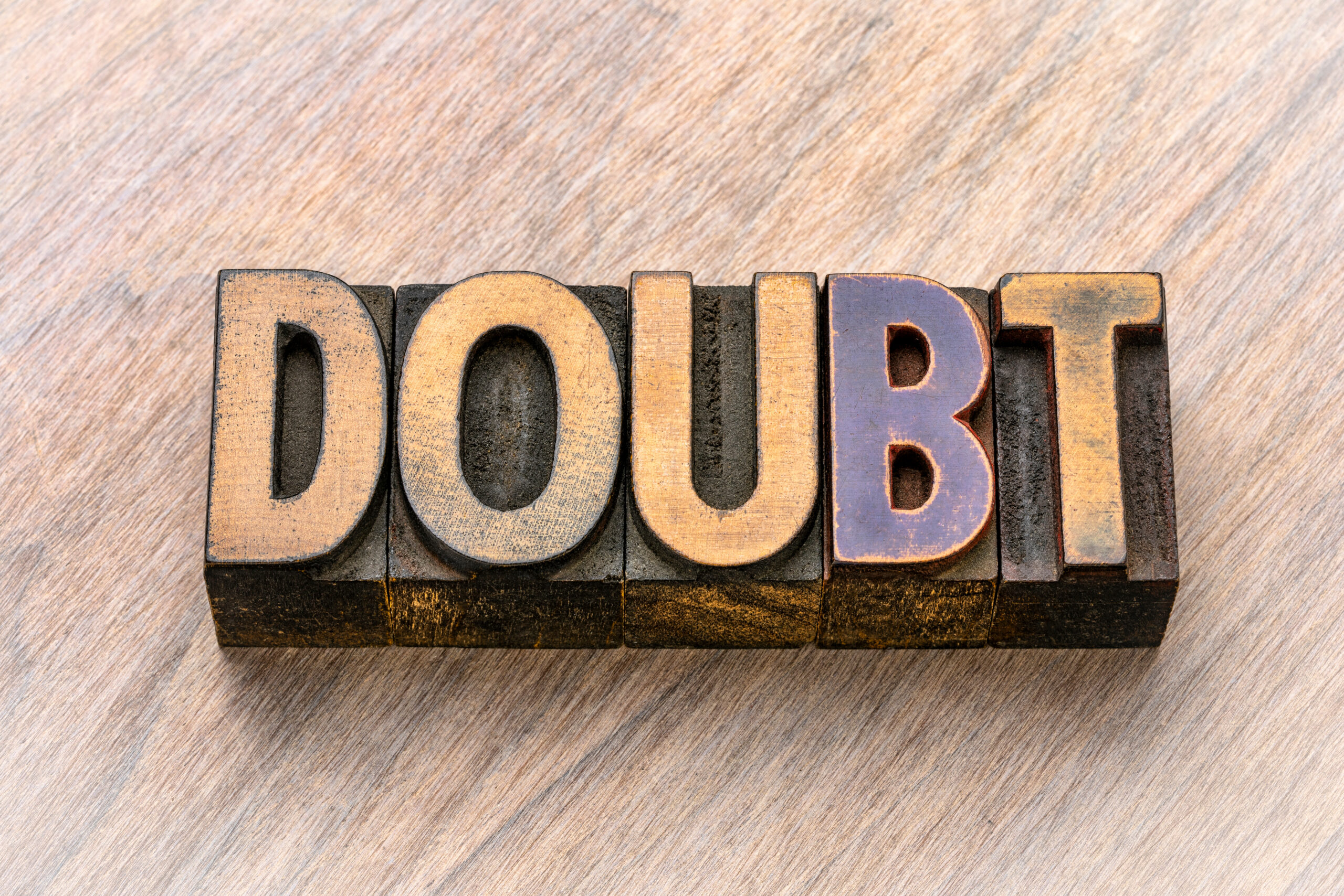 doubt word in wood type
