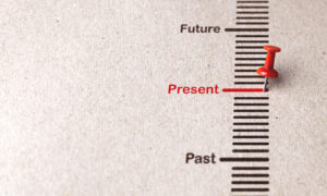 Red pin marks Present on paper background for focusing on current affairs, popular business trends concept.