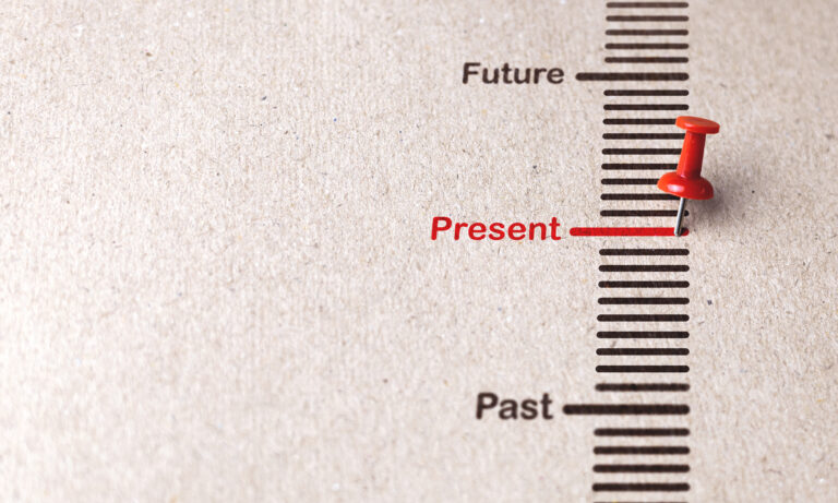Red pin marks Present on paper background for focusing on current affairs, popular business trends concept.