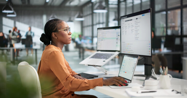 Young African Woman Quality Manager Analyzing Audit Data